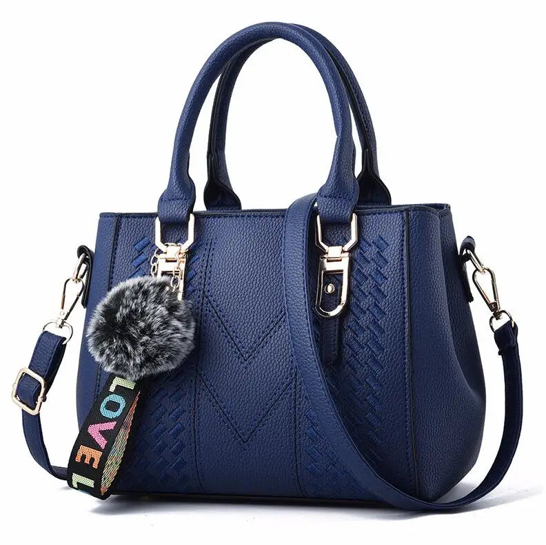 👜 Embroidered Leather Messenger Handbag – Stylish Women's Shoulder Bag with Hair Ball Charm