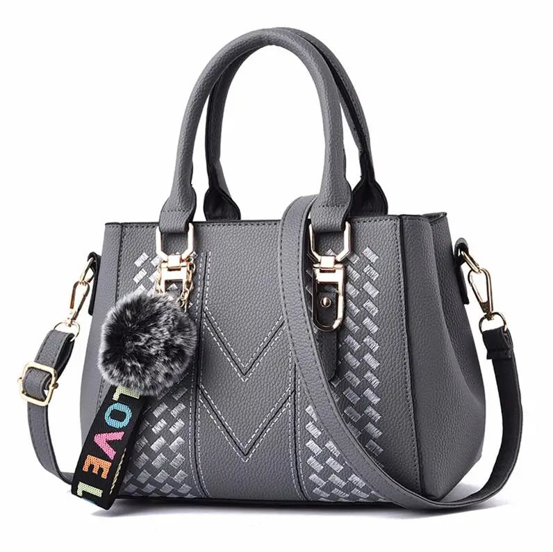 👜 Embroidered Leather Messenger Handbag – Stylish Women's Shoulder Bag with Hair Ball Charm