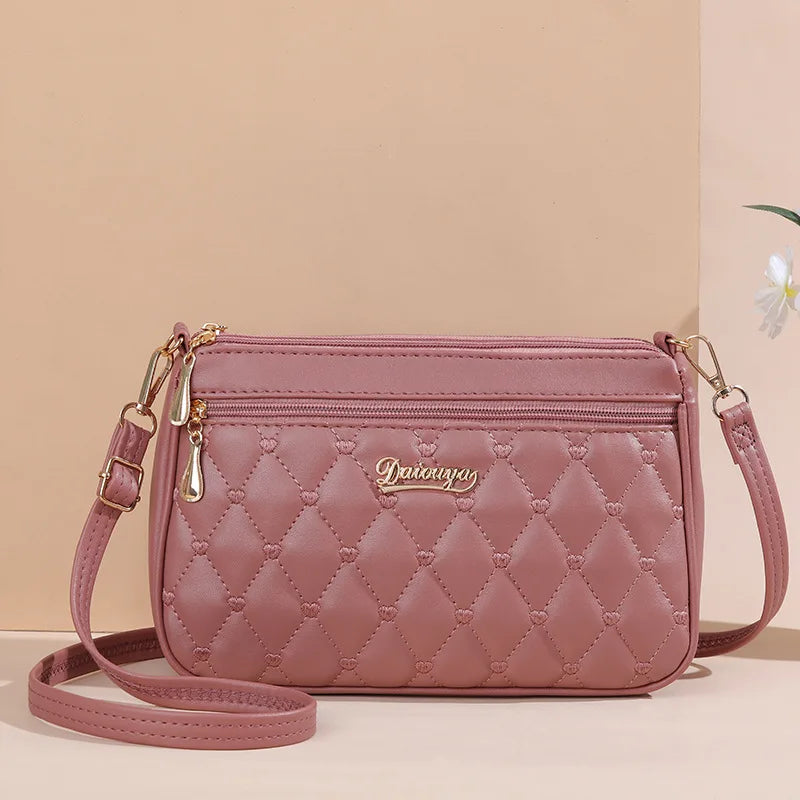 👜 Embroidered Leather Messenger Handbag – Stylish Women's Shoulder Bag with Hair Ball Charm