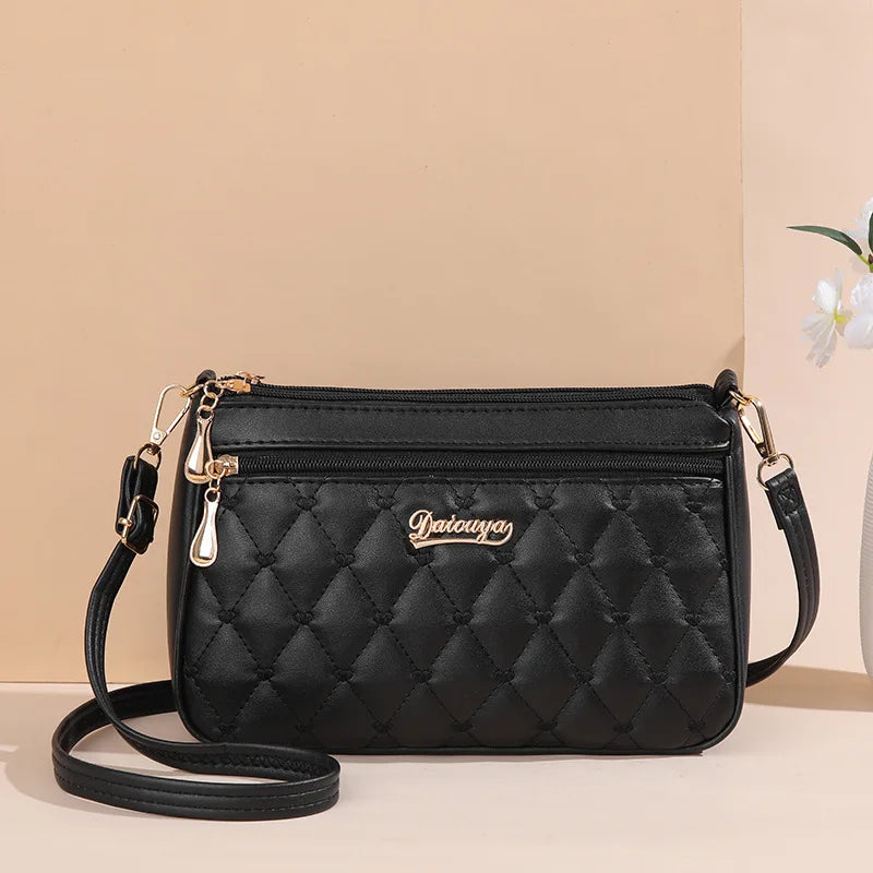 👜 Embroidered Leather Messenger Handbag – Stylish Women's Shoulder Bag with Hair Ball Charm